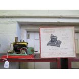 A Mamod S.E.1 red and green spirit-fired Stationary Steam Engine with instructions in original