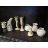 A Royal Worcester blush ivory tusk ice jug, 15cm high, a pair of spill vases 16cm high, two pairs of