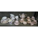 A pink Tuscon china coffee service with gilt floral decoration (15 pieces), and a Queen Anne part