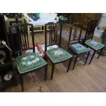 A set of three 1920s bedroom chairs with rail backs and tapering legs, and another bedroom chair (