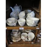 A Colclough part tea service with red and black foliate design, 32 pieces, and a Johson Bros. Snow