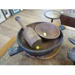 A tribal stained carved wood bowl, with twin handles and four feet, 36cm wide, a turned fruitwood