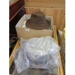 A Herbert Johnson brown trilby hat, 7 1/8 size, a Dunn & Co bowler hat, and a Moss Bros. grey top