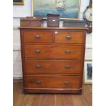 An Edwardian stained beech chest of drawers, with two short and three long graduated drawers on