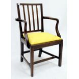 A GEORGE III MAHOGANY ELBOW CHAIR with yellow upholstered inset seat, 60cm wide