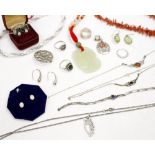 A COLLECTION OF JEWELLERY including a coral necklace, jade pendant, silver necklaces, rings, opal