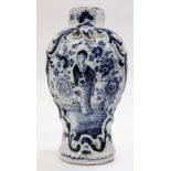 AN ANTIQUE BLUE AND WHITE DELFT POTTERY VASE of baluster form with floral and figural decoration,