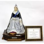 A ROYAL WORCESTER LIMITED EDITION FIGURINE OF QUEEN VICTORIA, numbered 22/250 with certificate of