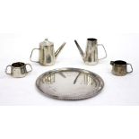 A BIRMINGHAM SILVER DOLLS HOUSE TEA SET consisting of tea pot, water jug, cream jug, sugar bowl