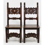 A SET OF SIX RENAISSANCE STYLE CHAIRS with heavily carved splats, 117cm high