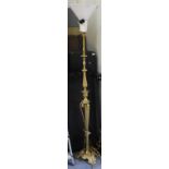 AN OLD BRASS LAMP STANDARD with cast triform base 170cm high overall