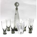 A SET OF SIX HOLME GUARD GLASSES (one A/F) and a matching decanter designed by Per Lutken and also