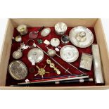 A PERSPEX COVERED CASE AND CONTENTS THEREIN including a continental silver Mexican sombrero, novelty