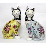 TWO GALLE CATS, titled 'Mottahedek', 33cm high (2)