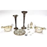 A PAIR OF SILVER GRAVY BOATS dated 1933, two silver pepperettes, salt spoons, glass stand, silver