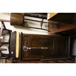 AN EDWARDIAN MUSIC CABINET, 54cm wide x 143cm high; an Edwardian piano stool and an Edwardian