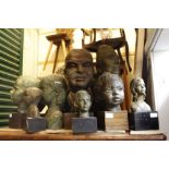 A SMALL COLLECTION OF STUDIO BUSTS of varying styles and sizes, some on wooden plinths, from the