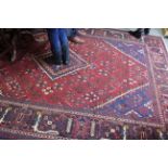 A RED AND BLUE GROUND MEIMEH RUG