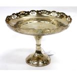 A BIRMINGHAM SILVER DISH standing on pedestal with pierced cut decoration, dated 1931, ISJL & Co.,