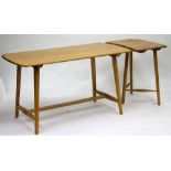 AN ERCOL LIGHT ELM DINING TABLE, 137cm wide with an extending table (2)