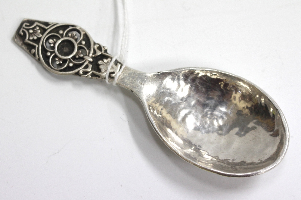 A LONDON SILVER SPOON by Amy Sandheim with beaten effect bowl, dated 1939