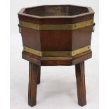 AN 18TH CENTURY STYLE OAK AND BRASS BOUND OCTAGONAL COOLER 49cm high