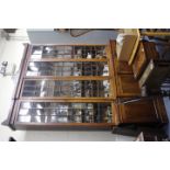 A 19TH CENTURY MAHOGANY BREAK FRONT BOOKCASE of large proportions and having four glazed doors above