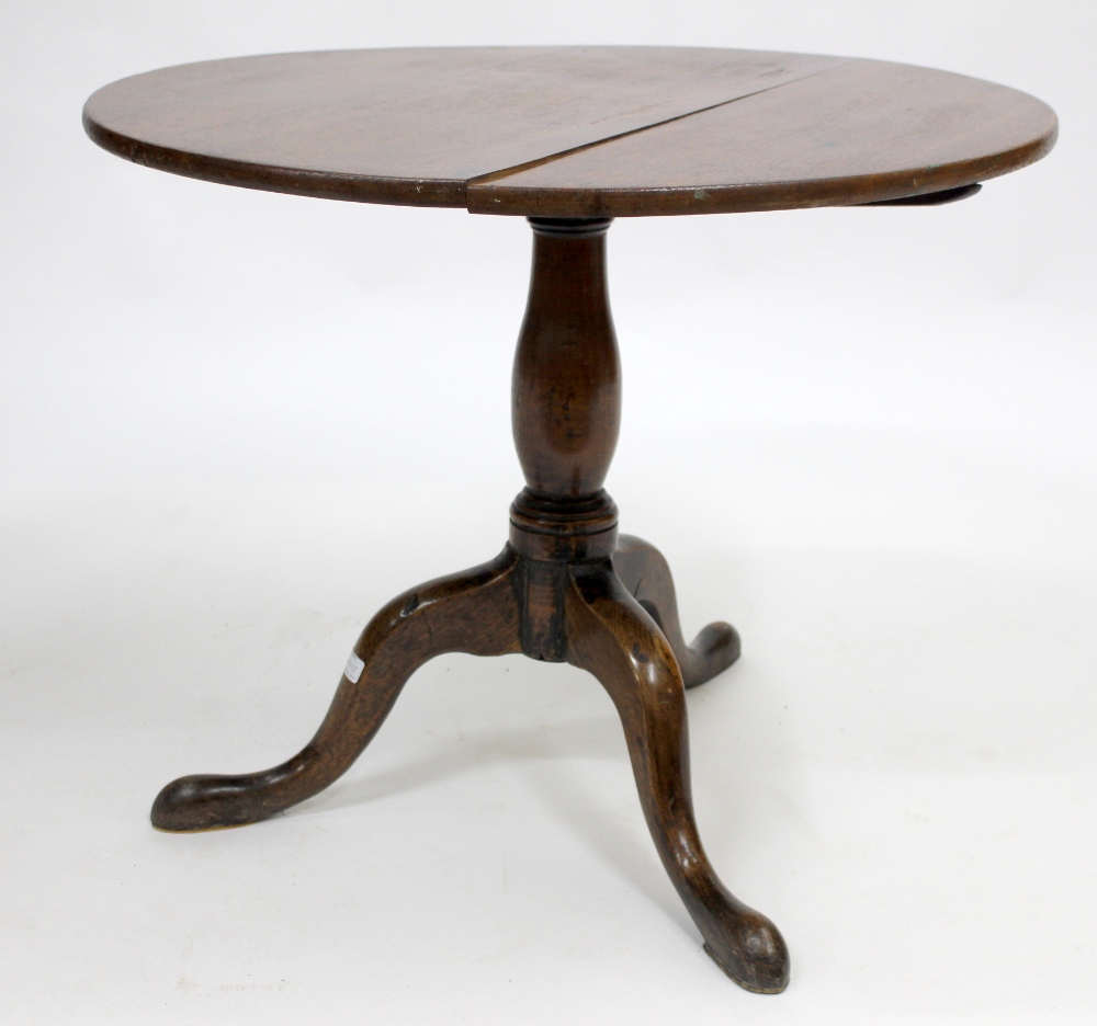 A 19TH CENTURY OAK TILT TOP TRIPOD TABLE, 78.5cm across approximately and a white painted