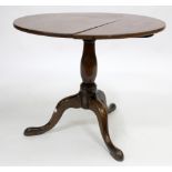 A 19TH CENTURY OAK TILT TOP TRIPOD TABLE, 78.5cm across approximately and a white painted