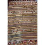 AN OLD YELLOW AND ORANGE STRIPPED KELIM RUG, 180cm x 220cm