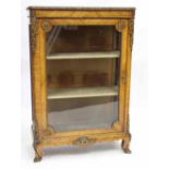 AN EARLY VICTORIAN WALNUT PIER CABINET with metal mounts standing on cabriole feet, 75cm x 111cm