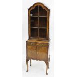 AN 18TH CENTURY STYLE BURR WALNUT DISPLAY CABINET by Hallidays, with astragal glazed panel, standing