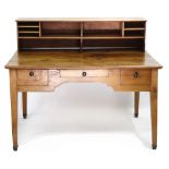 A 19TH CENTURY FRENCH CHERRY WOOD DESK with a rectangular top, three frieze drawers and square