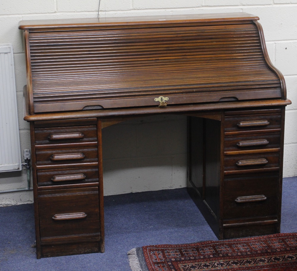 A 19TH CENTURY MAHOGANY ROLL TOP DESK, 132cm wide x 114cm high x 88cm deep together with a