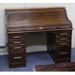 A 19TH CENTURY MAHOGANY ROLL TOP DESK, 132cm wide x 114cm high x 88cm deep together with a