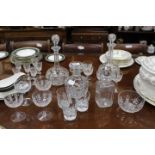 A LARGE SELECTION OF CUT CRYSTAL AND GLASSWARE including decanters, bowls, tumblers, sherry