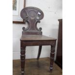 A VICTORIAN MAHOGANY HALL CHAIR on turned forelegs 84cm