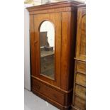 A LATE VICTORIAN SATIN WALNUT WARDROBE fitted with a mirrored door and long drawer 115cm wide x