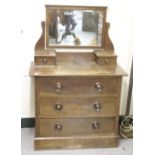 AN OAK ARTS & CRAFTS DRESSING TABLE fitted with copper handles and a late Victorian low balloon back