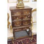 A LATE 17TH CENTURY SMALL OAK CHEST on stand, having three long drawers above two short drawers 66cm