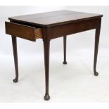 A GEORGIAN STYLE MAHOGANY SIDE TABLE fitted with frieze drawer 85cm x 71cm x 59cm