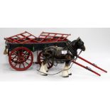 A HORSE DRAWN CART MODEL