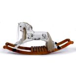 A WHITE ROCKING HORSE, 142cm long x 66cm high