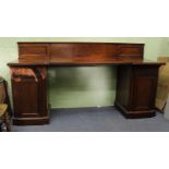 A WILLIAM IV MAHOGANY INVERSE BREAKFRONT PEDESTAL SIDE BOARD with raised back, 229cm wide