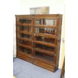 A PAIR OF MAHOGANY GLOBE WERNICKE STYLE BOOKCASES with architectural decoration