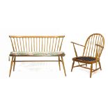 AN ERCOL LIGHT ELM SPINDLE BACK TWO SEATER SETTEE, 110cm wide and an Ercol light elm spindle back