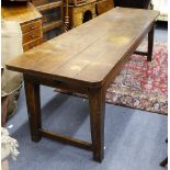 AN ANTIQUE ELM FOUR PLANK TOP DINING TABLE of generous proportions 272cm x 79cm x 74cm