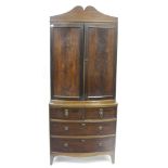 A VICTORIAN MAHOGANY BOW FRONTED CHEST of two short and three long drawers with a bow fronted