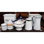 A COLLECTION OF ENAMELLED KITCHENALIA including jugs, two bread bins etc.