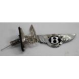 A BENTLEY MINT AND UNUSED STAINLESS-STEEL SPRING LOADED 'FLYING B MASCOT', complete with all